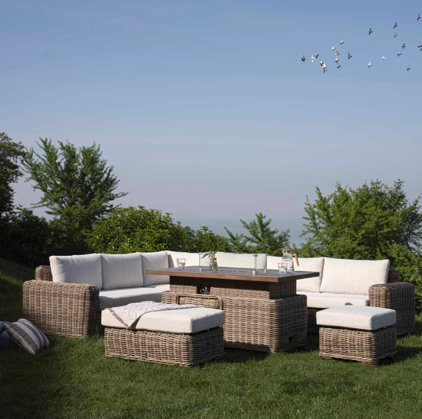 A Bellagio Round Wicker Large Corner Casual Dining Set with Rising Firepit Table, Natural