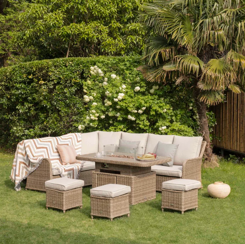 A Bellagio Round Wicker Large Corner Casual Dining Set with Rising Firepit Table, Natural